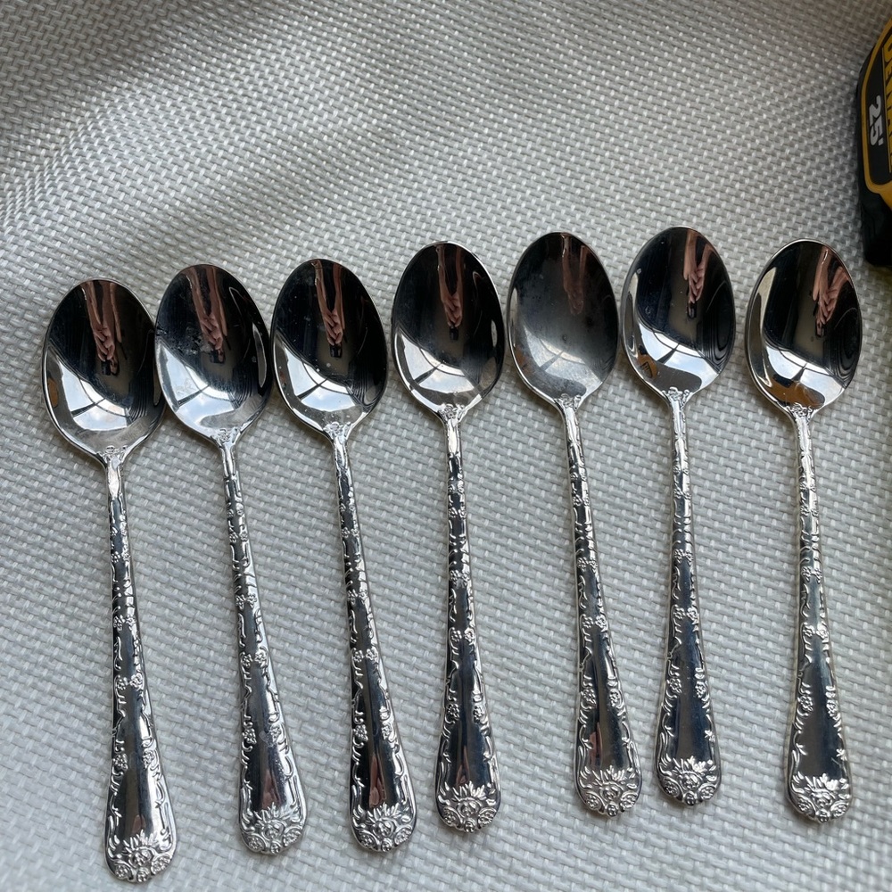 WM Rogers Silverplate set of  7 Spoons Enchanted Rose design